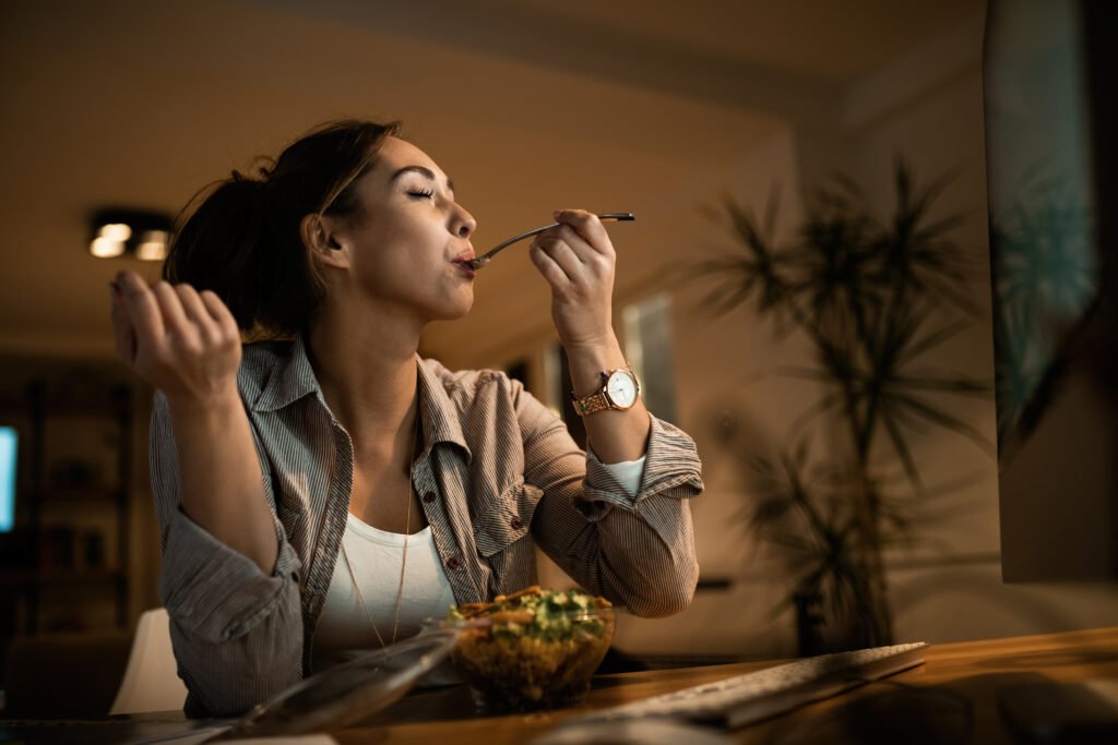 below view of woman with eyes closed enjoying in a taste of heal
